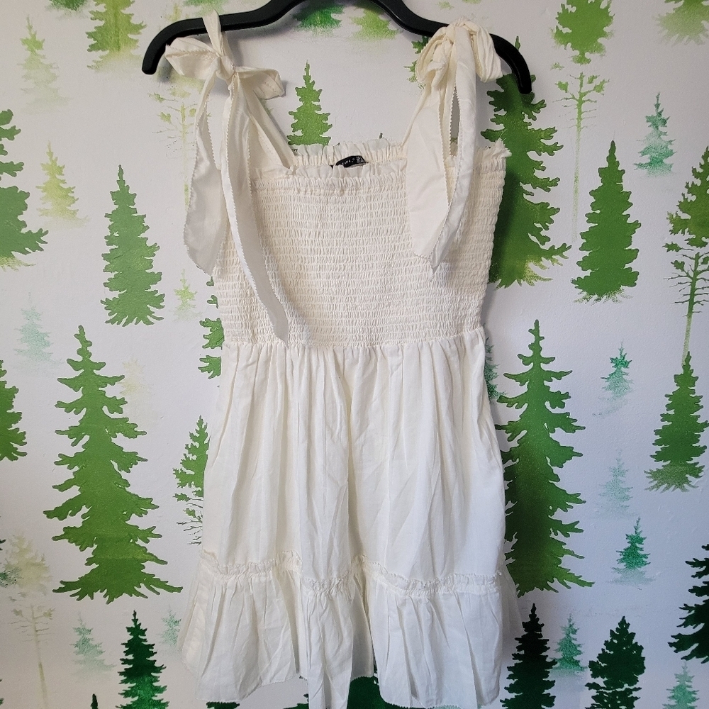 Black Tape Smocked Babydoll Dress.